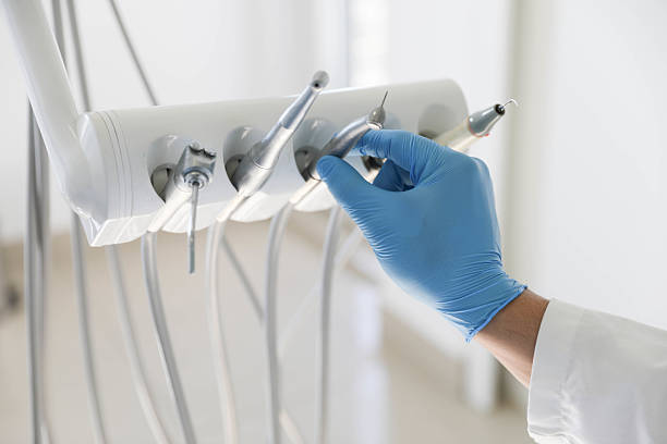 Professional Invisalign Clear Aligners technician working in Gladwin, MI